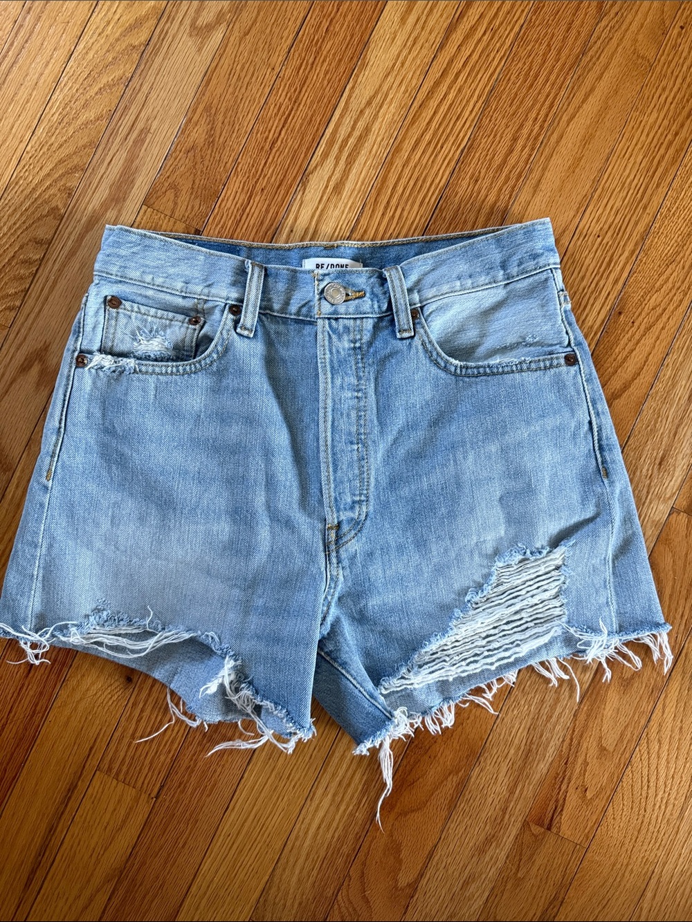 Re/Done Light Blue Distressed Denim Shorts